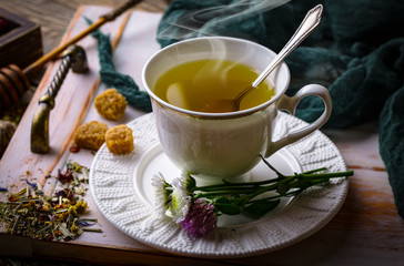 Tea in a cup on an old background
