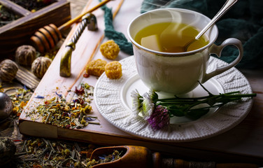 Tea in a cup on an old background