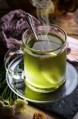 Tea in a cup on an old background