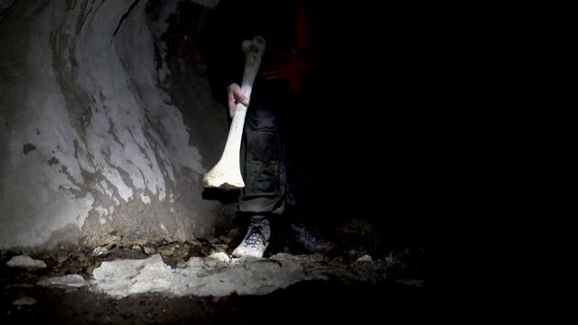 Cavers discover bones of extinct Giant Moa in caves in New Zealand - comparing leg bone size to human leg