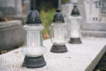 Candles on the graves.