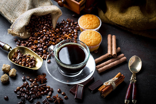 Black coffee on old background © Karnav