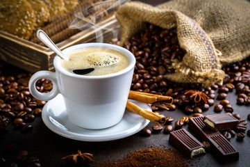Black coffee on old background