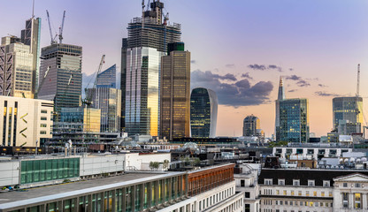  Aerial view of skyscrapers of the world famous bank district of central London at sunset