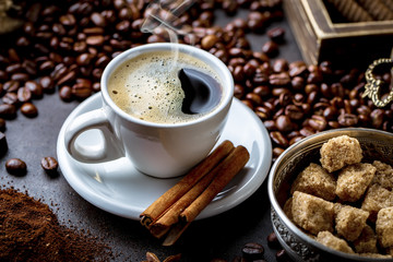 Black coffee on old background