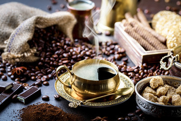 Black coffee on old background