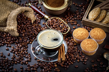 Black coffee on old background