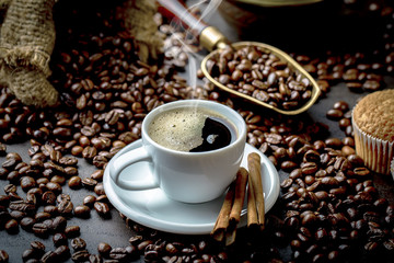 Black coffee on old background
