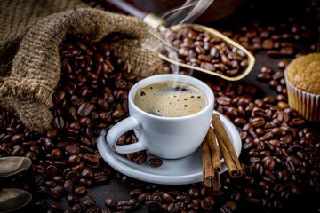 Black coffee on old background