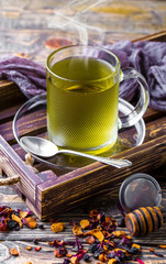 Tea in a cup on an old background
