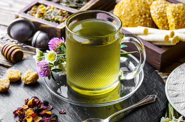 Tea in a cup on an old background