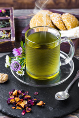 Tea in a cup on an old background