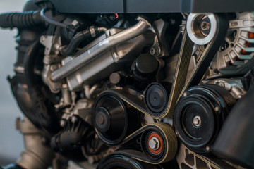 Fototapeta na wymiar Modern car clean look engine with timing and serpentine belts