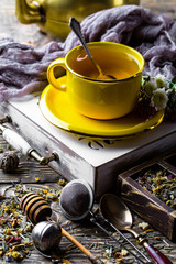 Tea in a cup on an old background