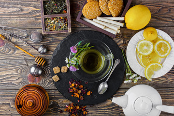 Tea on an old background, in a composition with accessories on the table
