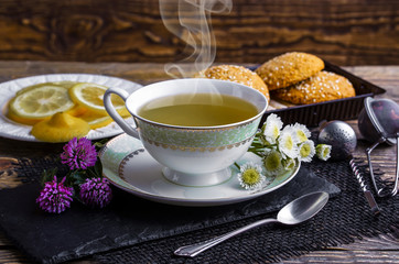 Tea in a cup on an old background