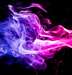 Colored smoke on black background