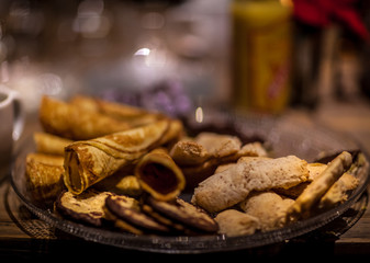 Home baking themed composition with baked cookies and candles