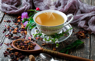 Tea in a cup on an old background