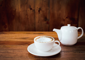 A cup of coffee on table in cafe