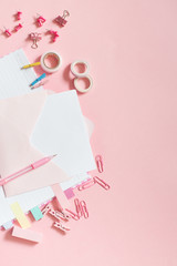 Flat lay stylish set. School stationery. Back to school concept. Pink background.