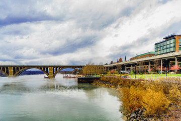 Francis Scott Key Bridge across Potomac River, winter fog on the water.