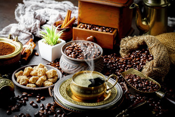 Black coffee on old background