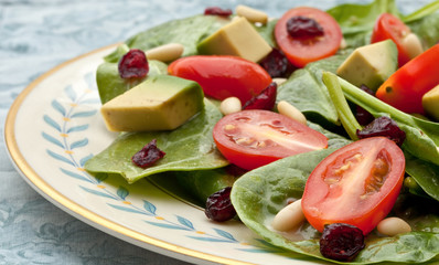 Vegetarian detox healthy salad with spinach base