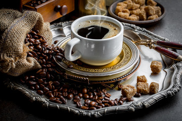 Black coffee on old background