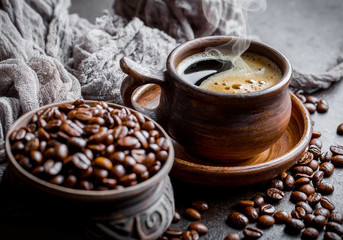 Black coffee on old background