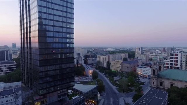 Drone footage of Warsaw cosmopolitan district - Plac Grzybowski in the evening