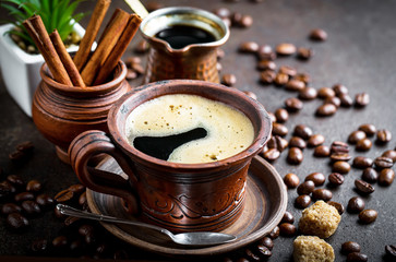 Black coffee on old background