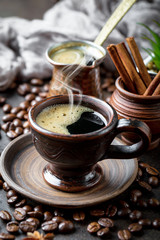 Black coffee on old background