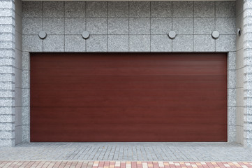 A closeup shot of automatic metal roller door used in factory, storage, garage, and industrial...