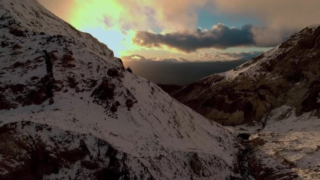Mountain. Volcano. Nature. Winter. Snow. Kamchatka. Russia. Sunrise. Aerials. 4k. Drone