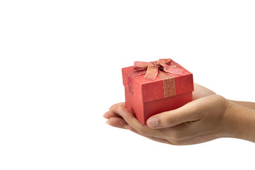 Hand holding red gift box.