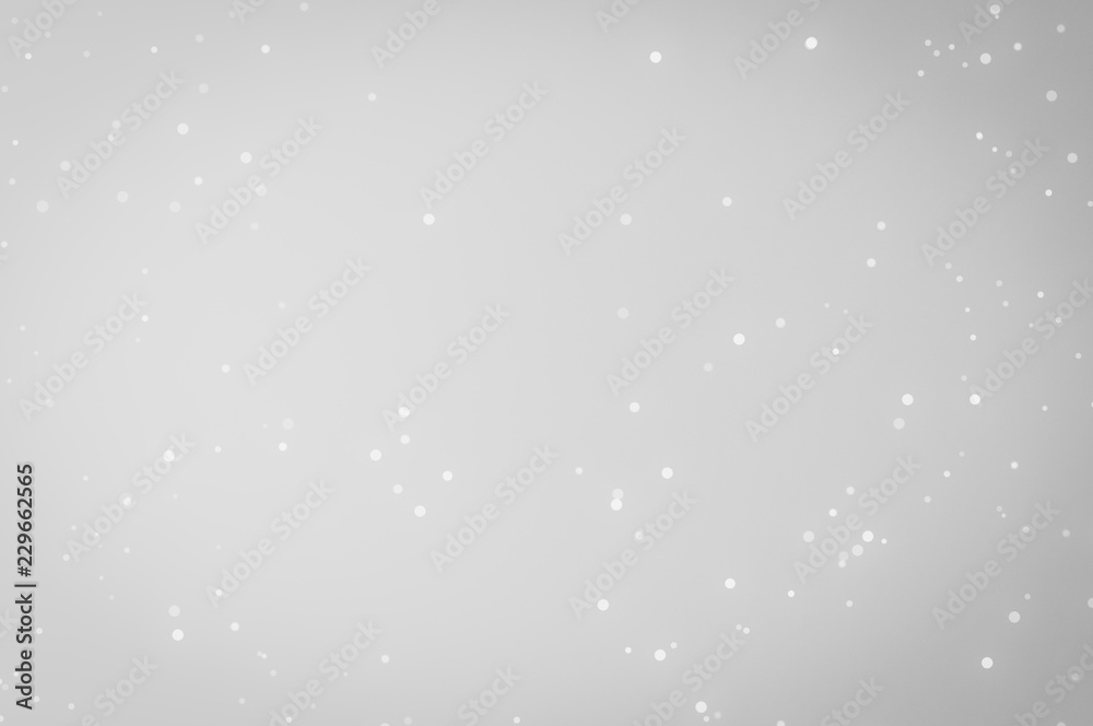 Wall mural white and silver lights on bokeh abstract background.