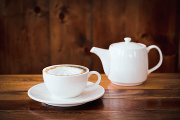 Obraz na płótnie Canvas A cup of coffee on table in cafe