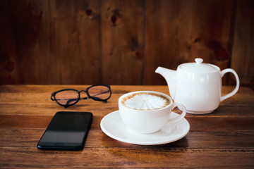 A cup of coffee on table in cafe