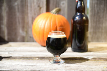 Home Brewed pumpkin ale beer in frosty glass