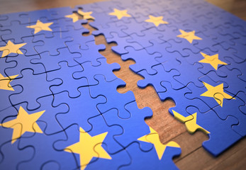 Fototapeta premium Puzzle finished, but split in half. Concept of breaking the European Union.