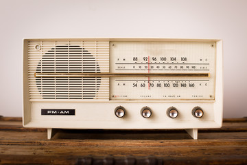 Retro Radio Sitting on Vintage Wooden Trunk