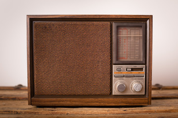Retro Radio Sitting on Vintage Wooden Trunk