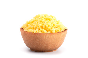 Bowl of Natural Yellow Beeswax Pearls - obrazy, fototapety, plakaty