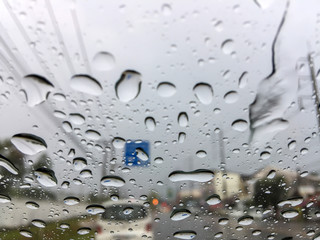 Rain on the glass front car in the morning