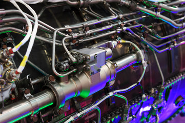 Engine of fighter jet, internal structure with hydraulic, fuel pipes and other hardware and equipment, army aviation, military aircraft and aerospace industry