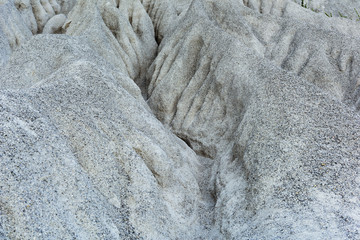 A rocky mountain or pile of fine white stone, which was mined from the mining process