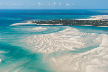 An Island in Vilankulo, Mozambique, Africa As Seen From Above, Surrounded by Sand and Water - obrazy, fototapety, plakaty
