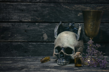 Magic potion on magic table background. Witchcraft concept.