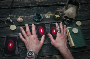 Tarot cards on fortune teller desk table background. Futune reading concept. Divination.